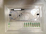 Optinetrics Planar Optical Power Splitter POPS-0-070102-1X8-N35-W0-D17. Fixed Price $359.99.