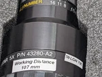 Melles Griot Invaritar 5X Telecentric Lens 59-LGN-705 43280-A2, 107MM Wd, Case. Fixed Price $1499.00.